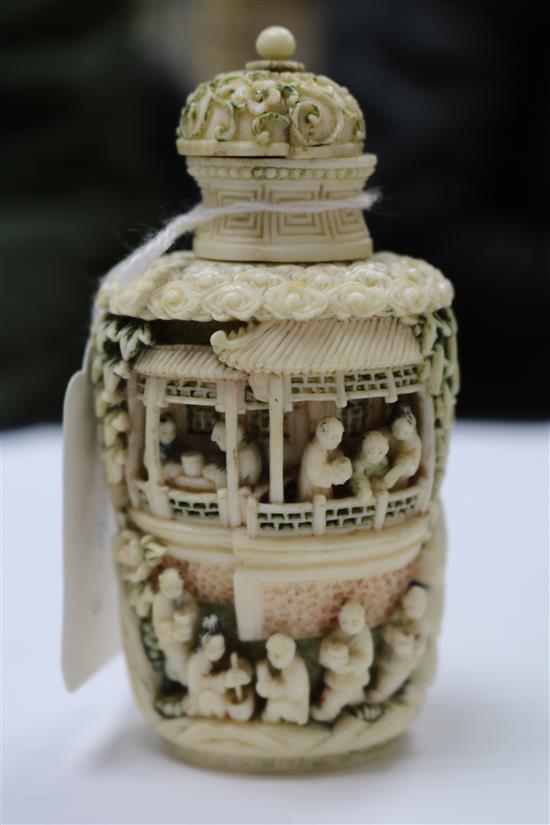 A Chinese coloured ivory snuff bottle 19th century 10cm.